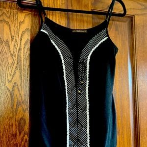 Sexy black and white tank. Great condition.